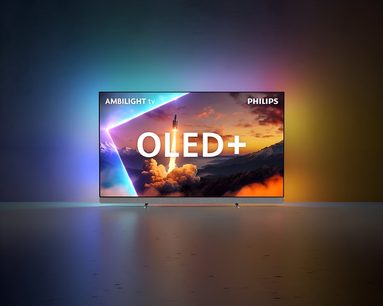 Телевизор Philips 77OLED910 черен, тънка метална рамка, долна звукова лента от сиво платно, многоцветно задно Ambilight хало, изглед отпред