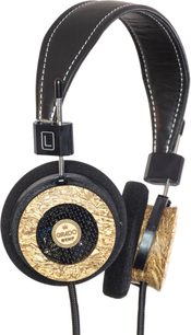Åpen hi-fi hodetelefon Grado Hemp, sett fra siden, svart hodebøyle med hvite sømmer, sirkulære øreklokker i teksturert tre