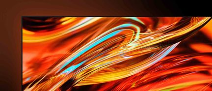 Televisor de pantalla plana con visual abstracto naranja rojo y azul de líneas fluidas en primer plano