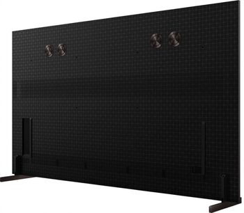 Televizor TCL 75X11L 2026 černý, zadní pohled s mřížkovaným panelem, středovým pruhem a bočními nožkami