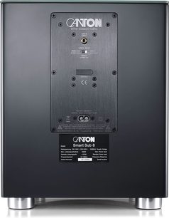 Svart Canton Smart Sub 8-subwoofer, vy bakifrån med anslutningspanel och cylindriska metallfötter