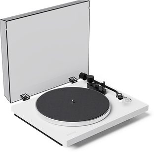 White Kanto OBI3 G2 turntable with raised transparent dust cover, black platter and visible tonearm