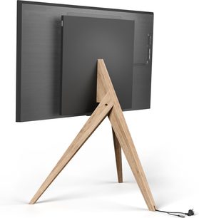 Lyst træ Spectral art AX TV-møbel med trekantet fod, integreret sort skærm og åben hylde, set fra 3/4 vinkel