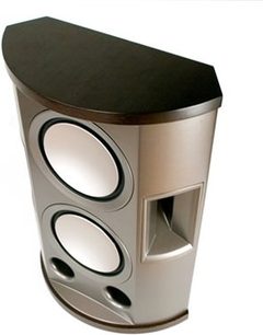 Klipsch P-27S espresso højttaler, set forfra i perspektiv, cylindrisk buet form, mørk træfinish og sort gitter med to ovale åbninger