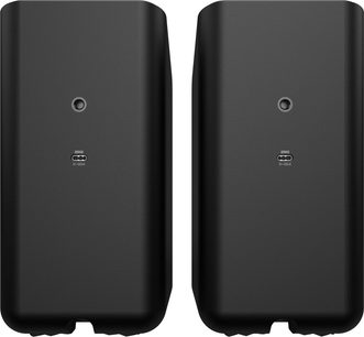 Комплект от две безжични колонки Klipsch Flexus Surr 200 в матово черен пластмасов цвят, заден изглед, показващ централното кръгло отверстие за монтаж и сервизното USB-C гнездо