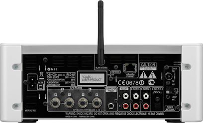 Amplificador de red Denon CEOL N7 blanco, vista frontal, con conectores, botones, pantalla y antena Wi-Fi