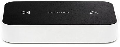 Octavio Stream netværksaudioafspiller, rektangulær sort og hvid kabinet, frontpanel med logo og knapper, set oppefra