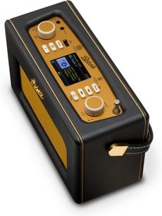 Roberts Revival iStream 3L bordradio, set fra oven, rektangulær æske i sort kunstlæder med gyldne kanter, øverste panel i sennepsgul med farveskærm, to store cremefarvede knapper, små betjeningsknapper, USB-port og lydstik, højttalergitter i gul stof på siden og tilhørende sidehåndtag