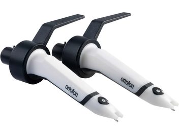 Dos cápsulas Ortofon Concorde MKII TWIN SCRATCH blancas y negras, vista superior, una al lado de la otra, con las puntas orientadas hacia la derecha