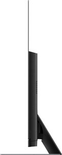 Panasonic TX-65GZ1500E-fladskærms-tv, set fra siden, flad skærm, smal sort ramme, rektangulært sort fod