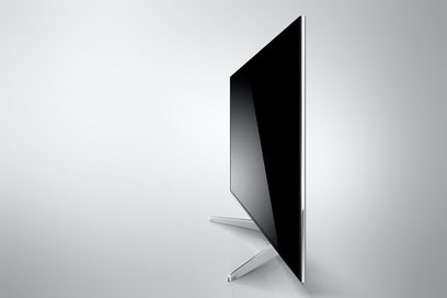 Panasonic TX-L47WT50 ultrafladskærms-tv, sort skærm, set fra siden på lys grå baggrund