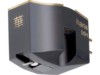 Cellule phono Hana MH en boîtier métallique gris anthracite mat, inscriptions et arêtes dorées, pointe de lecture et connecteurs plaqués or visibles, vue trois-quarts avant