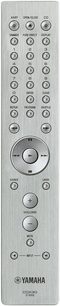 Yamaha CDX-30 fjernbetjening med 21 runde knapper og 2 ovale knapper på en børstet metaloverflade, set forfra