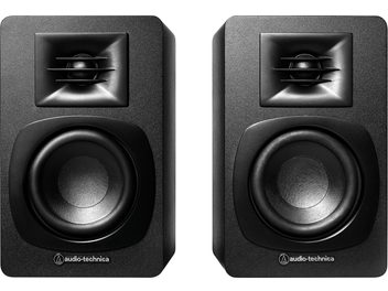 Audio Technica AT-SP3X Wireless Connected Speakers, front view, 2 black units, circular speakers, top grills