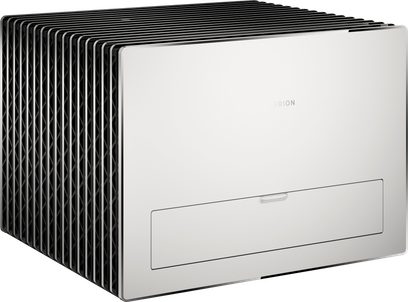 Valerion StreamMaster Plus 2 matte white aluminum projector, smooth front panel with a low rectangular hatch, large openwork black side fins, three-quarter front view