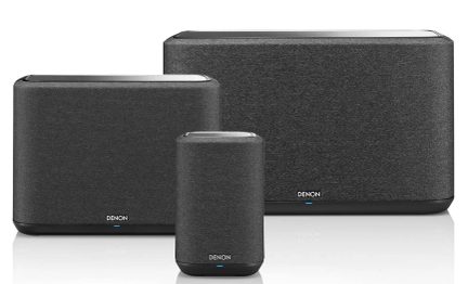 Three rectangular black speakers of different sizes, with the "DENON" logo in blue on the front face