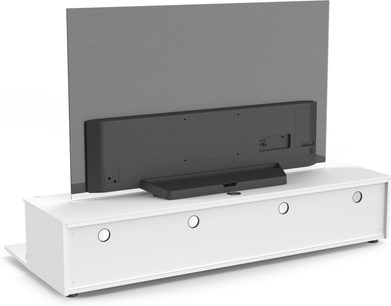 Bílý TV stolek se 4 zásuvkami, prostorem pro plochou obrazovku a přihrádkou pro audio-video zařízení pod ní