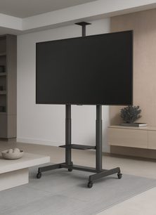 TV-Halterung Norstone Pro Vision Max schwarz aus Metall, Vorderansicht, doppelte Rohrstruktur mit zentralem Ablagefach, rechteckige Basis mit vier Rollen und Deckenbefestigungsplatte