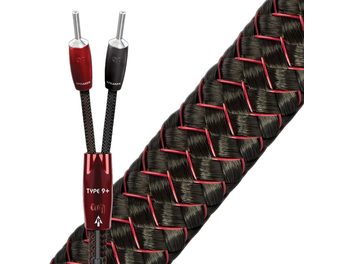 Audioquest Type 9+ audio kabel s červenými a černými banánkovými konektory, černý opletený plášť, detailní pohled