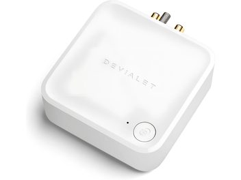 DEVIALET ARCH biely phono predzosilňovač, pohľad zhora, zaoblený štvorcový tvar, logo, zlaté tlačidlá, výstup na slúchadlá