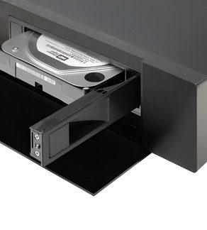 Disque dur dans un boîtier noir, vu de face et de côté, avec une étiquette indiquant "EN" sur le dessus du disque