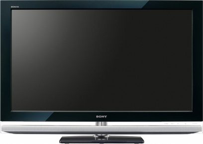 Černý plochý televizor Sony KDL-52Z4500 zepředu, vypnutý, na kovovém stojanu, s dálkovým ovladačem položeným před ním