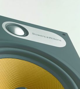Bowers & Wilkins 686 højttaler, nærbillede af fronten, mørkegrå kabinet med gul højttaler