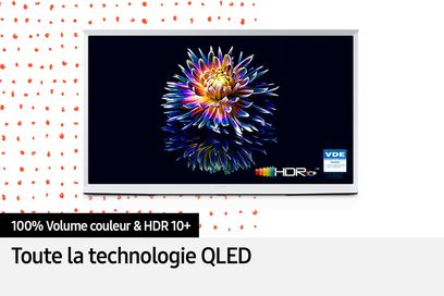 Samsung The Serif QE65LS01BB 2022 QLED-tv set forfra, skærmen viser en mangefarvet blomst på sort baggrund