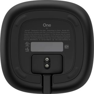 Trådløs, tilsluttet Sonos One SL højttaler i sort, set forfra, cylindrisk form, sort gitter, knapper på toppen