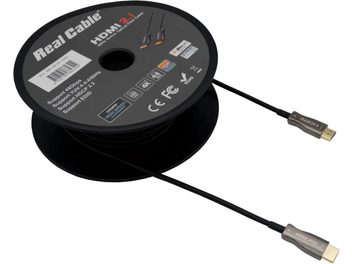 Przewód HDMI Real Cable HD-OPTIC 8K o długości 5 metrów, zwinięty, z widocznymi złączami na końcach, na czarnej szpuli z etykietą opisową