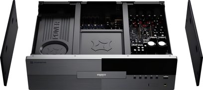 Magnetar UDP900 4K Blu-ray-spiller i svart med metallchassis, frontpanel i børstet aluminium, sett ovenfra med lokket fjernet som viser de interne strømforsyningsenhetene og kretskortene