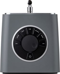 Rádio de mesa Ruark Audio R1S, vista superior, caixa em plástico cinza fosco, grande botão central rodeado por outros botões