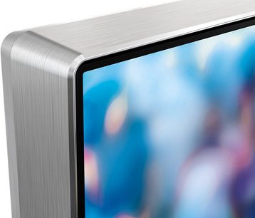 Philips 49PUS7809 tv set set fra siden, slukket skærm med blålige refleksioner, børstet sølvfarvet ramme