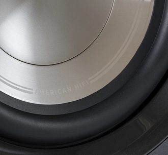 Polk Audio HTS 12 sort baskabin, nærbillede i nedadgående vinkel af forsiden, grå membran og mat sort kant