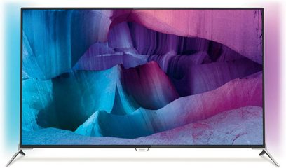 Nærbillede af skærmen på et Philips 49PUS7100 TV, der viser et abstrakt billede i levende farver