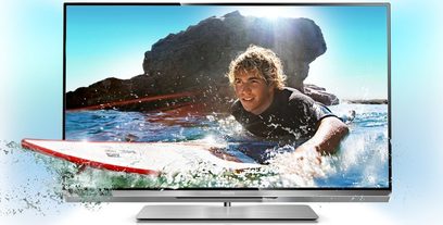 Philips 47PFL6877H tv der viser en surfer i en bølge, med vandsprøjt omkring skærmen, set forfra