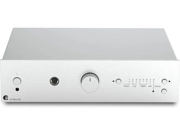 Pro-Ject Uni Box S3 integrated stereo amplifier silver, front view, brushed silver front panel with central button and source selectors