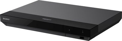 Leitor Blu-ray 4K Sony UBP-X700, visto em ângulo, caixa retangular preta, logotipo da Sony à esquerda, botão de energia à direita