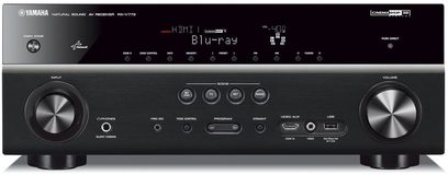 Yamaha RX-V773 sort hjemmebiografsforstærker, set forfra, sort front med knapper og LCD-skærm, to sølvfarvede drejeknapper