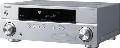 Pioneer VSX-1019AH sølvfarvet hjemmebiografsforstærker, frontvisning, blå skærm, sølvfarvede knapper og drejeknapper, 2 hovedtelefonstik