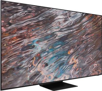 Samsung QE85QN800A-fladskærm, der viser et abstrakt, flydende og hvirvlende multifarvebillede