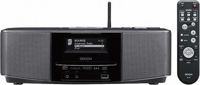 Sort Denon S-52 Hi-Fi mini-anlæg, set forfra, med CD-afspiller, LCD-skærm, knapper og fjernbetjening
