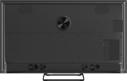 Panasonic TN-55W95C-TV sett bakfra, svart bakpanel med ventilasjonsrister, sentralt sirkulært element og fot