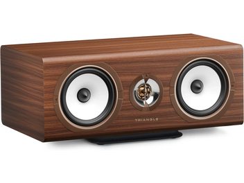 Triangle Solstice C3 center speaker in teak, brown wood-look cabinet with two white speakers seen from the front