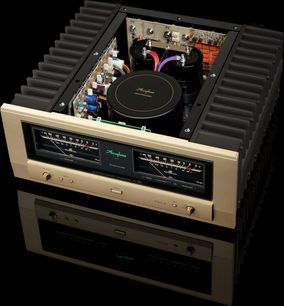 Интегриран стерео усилвател Accuphase A-48S, изглед отгоре, правоъгълен корпус, златна предна част, два големи VU метъра, кръгли бутони, черни охладителни ребра, видими вътрешни компоненти