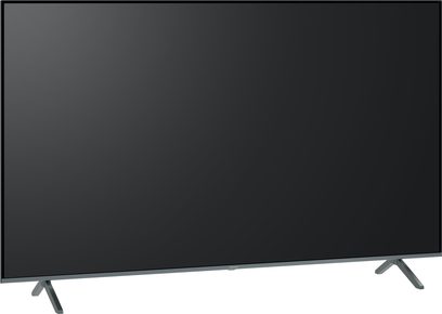 Panasonic TV-65W95AEG højdefinitionsfjernsyn, sort skærm, set forfra, grå metalfødder, let skrå synsvinkel
