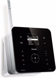 Philips Streamium WAS6050 sort digital radio, set forfra, berøringsskærm der viser menuen "Playlister Kunstnere Album Genrer Alle numre"