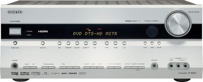 Ampli home-cinéma Onkyo TX-SR606 argenté, vue de face, affichage "DVD DTS-HD MSTR", nombreux boutons et connecteurs