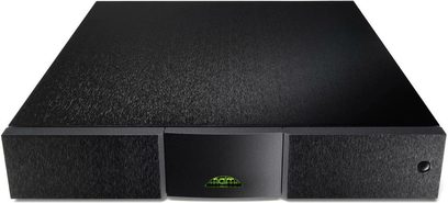 Naim Audio 555 PS DR separat strømforsyning i sort, set forfra, rektangulær form, mat tekstureret overflade, grønt logo i midten