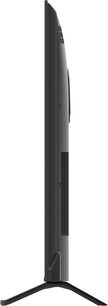 Panasonic TV-65W95BEG sort fjernsyn i høj opløsning, mat sort plastkasse med tynd ramme, sidevisning der viser den slanke profil og det omvendte V-formede fodstativ
